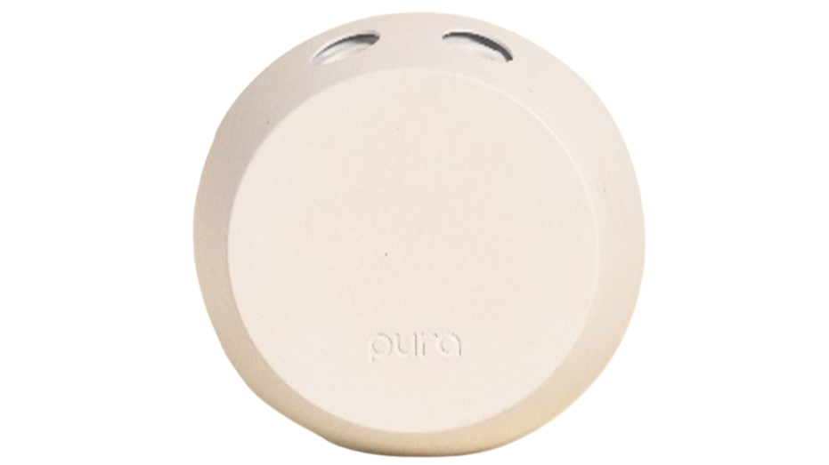 A photo of the Pura scent plug recalled due to a magnet failure.