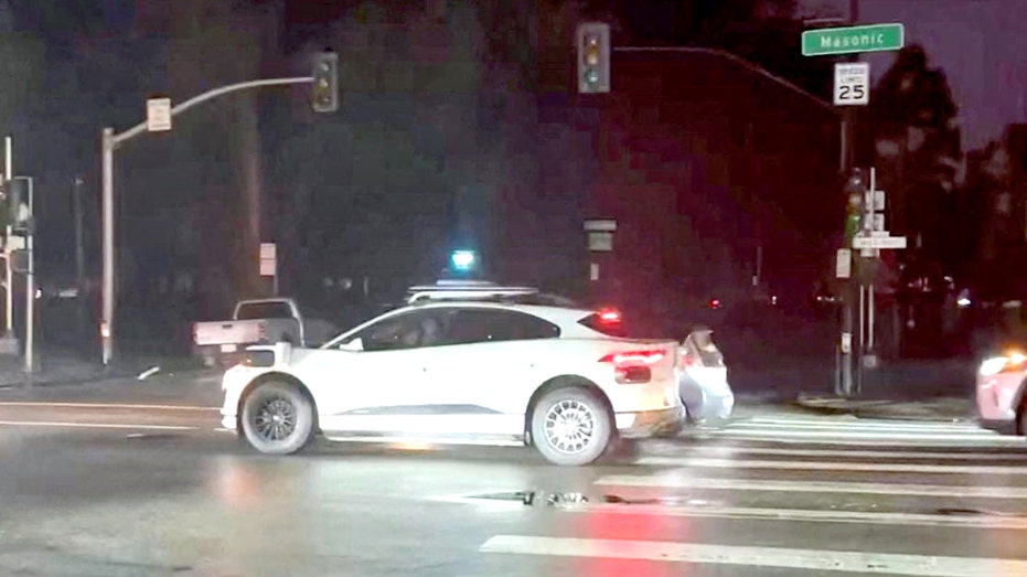 Waymo car is stopped in the road