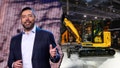 Joe Creed, chief executive officer of Caterpillar Inc., and a view of a Caterpillar (Cat) excavator at the CES (Consumer Electronic Show) 2026. - Fox News