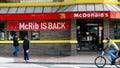Pedestrians move past a McDonald's restaurant on November 2, 2010 in Washington, featuring a sign announcing the return of the "McRib". Fast food giant McDonald's is bringing back a sandwich -- the McRib -- that gained cult acclaim over the last three decades, in a move lauded by fans known to travel great distances in the hunt for the coveted treat. The boneless pork chop between a bun and slathered with tangy BBQ sauce, topped with onions and pickles, was first launched in 1981, and with rare exceptions has only been offered for sale in select McDonald's for a few weeks at a time.  From Tuesday, November 2, it will be available nationwide, and for an entire month.   Among the sandwich's cult base -- there are some 300 fan groups on Facebook -- the reaction is close to ecstasy, not surprising as it's not unheard of for some to drive 10 hours at a stretch to get their hands on the sticky fast food delicacy.    AFP PHOTO /  Stephane Jourdain (Photo by stephane jourdain / AFP) (Photo by STEPHANE JOURDAIN/AFP via Getty Images) - Fox News