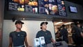 Employees work the counter at a McDonald's restaurant located inside the company's new corporate headquarters on June 4, 2018, in Chicago, Illinois. - Fox News