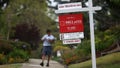 SAN FRANCISCO - MAY 04:  A letter carrier walks by a for sale sign that is posted in front of a home for sale May 4, 2009 in San Francisco, California. A report by the National Association of Realtors says that pending home sales were up 3.2 percent to 84.6 in March as home buyers took advantage of historically low mortgage interest rates and low home prices.  (Photo by Justin Sullivan/Getty Images) - Fox News