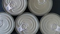 Set of different kinds of tin cans with canned food top view. - Fox News