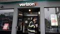 SAN FRANCISCO, CALIFORNIA - NOVEMBER 13: A pedestrian walks by a Verizon store on November 13, 2025 in San Francisco, California. Verizon has announced plans to cut an estimated 15% of its workforce, or 15,000 jobs, as part of a restructuring plan under its new CEO Dan Schulman. - Fox News