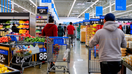 Consumers grocery shopping in Walmart. - Fox Business News