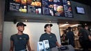 Employees work the counter at a McDonald's restaurant located inside the company's new corporate headquarters on June 4, 2018, in Chicago, Illinois. - Fox Business News