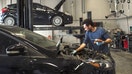A mechanic works on a vehicle in Canada, on Thursday, June 13, 2019. - Fox Business News