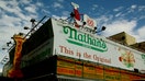 The original Nathan's Famous at the corner of Surf and Stillwell Avenues in the Coney Island began as a nickel hot dog stand in 1916 neighborhood of Brooklyn, New York City.   - Fox Business News