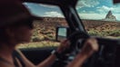 Traveling in Monument Valley, Arizona. The iconic rocky formations of the natural park viewed from a car, during a roadtrip - Fox Business News