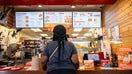 AUSTIN, TEXAS - MAY 08: A customer orders food at a Popeyes restaurant on May 08, 2025 in Austin, Texas. Restaurant Brands International fell short of analysts expectations after first-quarter earnings and revenue were reported earlier today. Same-store sales fell at Popeyes, Burger King and Tim Hortons at the close of the first quarter.  (Photo by Brandon Bell/Getty Images) - Fox Business News