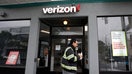 SAN FRANCISCO, CALIFORNIA - NOVEMBER 13: A pedestrian walks by a Verizon store on November 13, 2025 in San Francisco, California. Verizon has announced plans to cut an estimated 15% of its workforce, or 15,000 jobs, as part of a restructuring plan under its new CEO Dan Schulman.  - Fox Business News