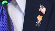 'Happy Trump' pins available, among other collectibles, after president dons new accessory