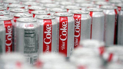Cans of Coca-Cola Co. Diet Coke brand soda move along a conveyor belt at the Swire Coca-Cola bottling plant in West Valley City, Utah, U.S., on Friday, April 19, 2019. The Coca-Cola Co. is scheduled to release earnings figures on April 23.  - Fox Business News
