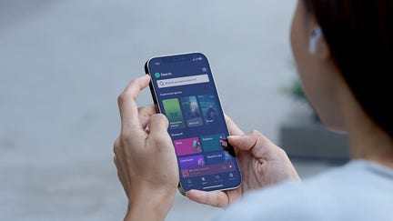 CHINA - 2024/11/09: In this photo illustration, A woman browses the Spotify app to listen music on her smartphone. (Photo Illustration by Serene Lee/SOPA Images/LightRocket via Getty Images) - Fox Business News