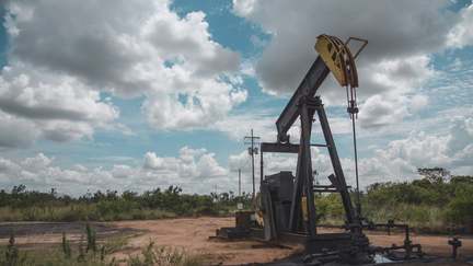 A pump jack stands near an oil spill at a Petroleos de Venezuela SA (PDVSA) facility in the Orinoco Belt of El Tigre, Venezuela. - Fox Business News