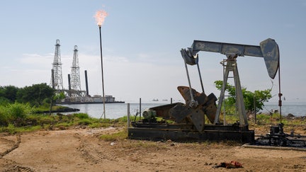 A Petroleos de Venezuela SA (PDVSA) oil pumpjack on Lake Maracaibo in Cabimas, Zulia state, Venezuela, Nov. 17, 2023.   - Fox Business News