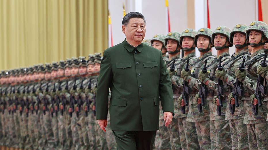 Xi Jinping walking next to military.
