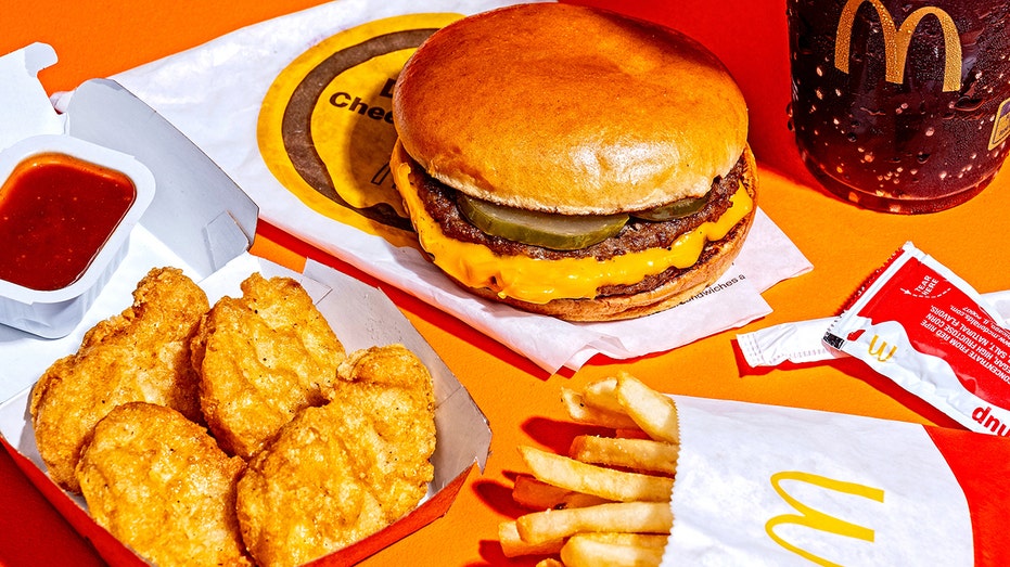 McDonald's nuggets, burger and fries on a table