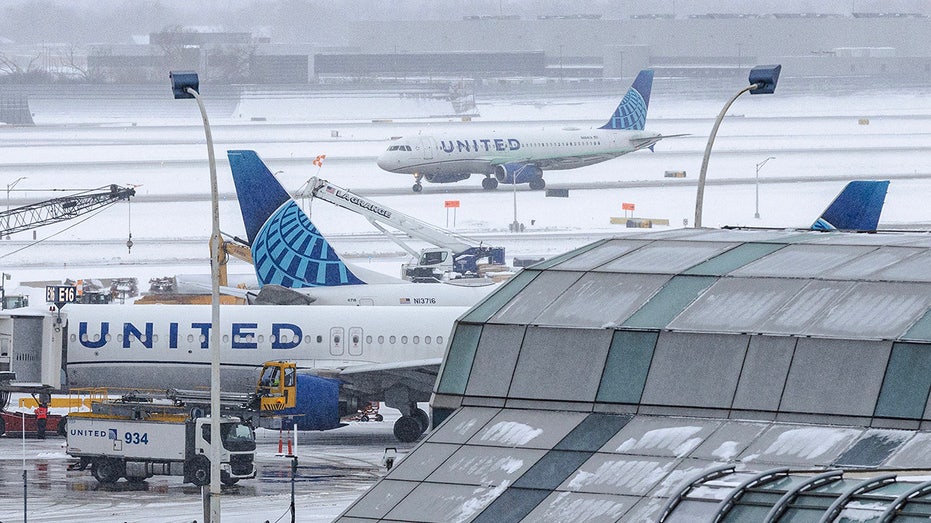 United Airlines planes after a winter snow storm affected the area at O'Hare International airport.