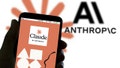 In this photo illustration, the logo of Anthropic's AI chatbot Claude is displayed on a smartphone, with the Anthropic logo visible in the background. - Fox News