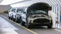 An employee looks under the bonnet of an Aston Martin DBX sport utility vehicle in the final inspection area at the Aston Martin Lagonda Global Holdings Plc factory in St Athan, U.K., on March 23, 2023. - Fox News
