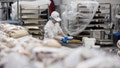 An employee slices cake inside the bakery of a Costco Wholesale Corp. store in Villebon-sur-Yvette, France, on Friday, Nov. 3, 2017. - Fox News