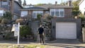 A real estate agent and a prospective buyer stand outside of a home during an open house in Seattle, Washington, on Jan. 18, 2026. - Fox News