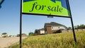 A for sale sign sits in front of a vacant lot near completed homes in a Missouri subdivision. - Fox News