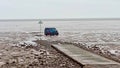 An Amazon delivery van stuck in the mudflats. - Fox News