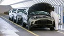 An employee looks under the bonnet of an Aston Martin DBX sport utility vehicle in the final inspection area at the Aston Martin Lagonda Global Holdings Plc factory in St Athan, U.K., on March 23, 2023. - Fox Business News