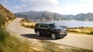 A model year 2022 Chevrolet Tahoe is seen driving. - Fox Business News