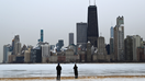 People look out toward the skyline from a frozen North Avenue Beach on January 24, 2026, in Chicago, Illinois. - Fox Business News