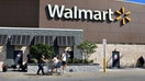 HOLLYWOOD, FLORIDA - NOVEMBER 20:  A Walmart sign hangs on the exterior of the store on November 20, 2025 in Hollywood, Florida. The retailer reported earnings per share of 62 cents and revenues of $179.5 billion through its latest quarter, sending the stock up more than 5.6% to above $106 shortly after trading opened.  (Photo by Joe Raedle/Getty Images) - Fox Business News