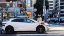 A Waymo vehicle drives with traffic on Dec. 27, 2025.  - Fox Business News