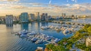 A north-facing aerial view of downtown West Palm Beach, Florida, at sunset. - Fox Business News