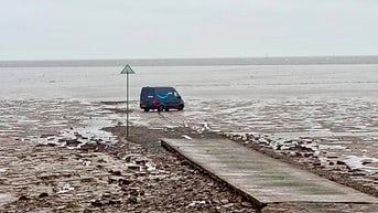 Amazon driver rescued after GPS leads delivery vehicle into UK mudflats - Fox News