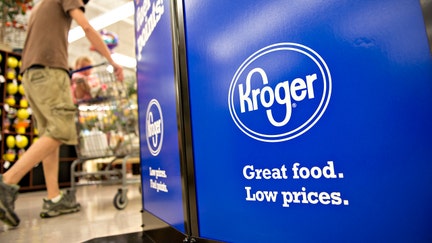 A shopper pushes a cart inside a Kroger supermarket in Peoria, Illinois. - Fox Business News