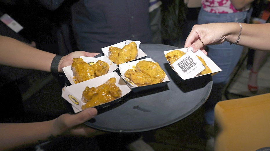 A serving of Buffalo Wild Wings displayed at a comedy event venue in Austin.