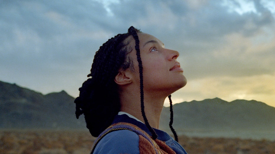 Woman looking up at the sky