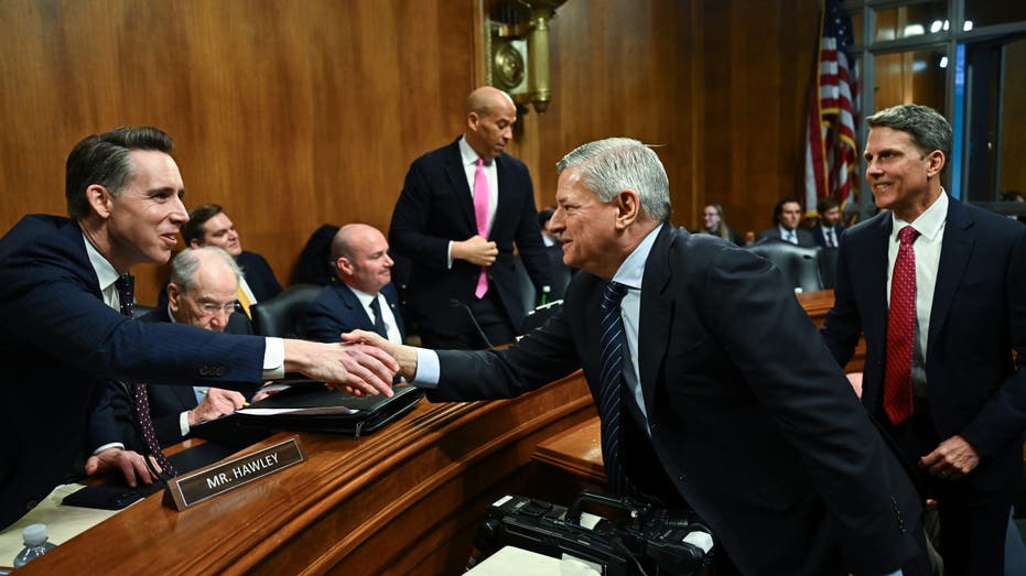 Netflix CEO shakes hand with Sen. Josh Hawley, R-Mo.