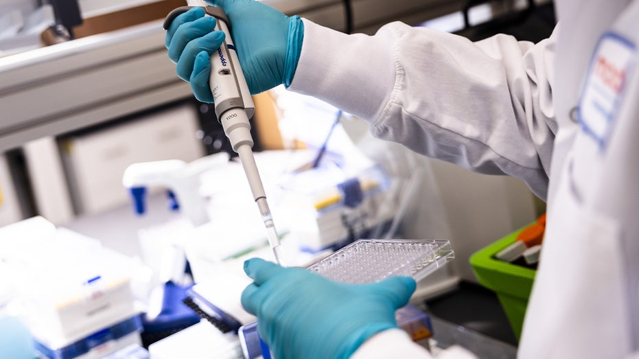 Cancer Vaccine research being performed in a Moderna lab