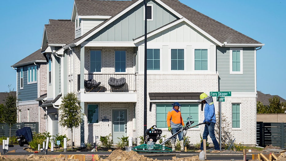 Workers in a Texas subdivision