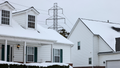 A power transmission line behind homes in a residential neighborhood in Columbus, Ohio, US, on Tuesday, Dec. 16, 2025. - Fox News