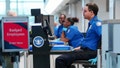 TSA agents work at a security checkpoint at Ronald Reagan International Airport in Arlington, Virginia., March 15, 2026. - Fox News