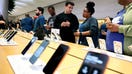 Apple employees help customers at the Fifth Avenue Apple Store on new product launch day on Sept. 19, 2025 in New York City. - Fox Business News