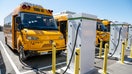 Zum electric school buses during a media preview at a bus depot in Oakland, California, US, on Tuesday, Aug. 27, 2024. Oakland Unified School District (OUSD) is the first major school district in California and the nation to transition to a 100% electrified school bus system with vehicle-to-grid (V2G) charging at scale.  - Fox Business News
