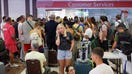 Stranded passengers wait near Emirates Airways customer service office at I Gusti Ngurah Rai International Airport in Kuta, Bali, Indonesia, after flights to Doha, Dubai, and Abu Dhabi were canceled following strikes on Iran launched by the U.S. and Israel, on March 1, 2026.

 - Fox Business News