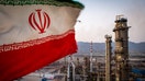 An Iranian national flag flies at the Persian Gulf Star Co. (PGSPC) gas condensate refinery in Bandar Abbas, Iran. - Fox Business News