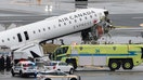 NEW YORK, NEW YORK - MARCH 23: An Air Canada Express CRJ-900 sits on the runway after colliding with a Port Authority fire truck at LaGuardia Airport on March 23, 2026 in New York City. All flights into and out of LaGuardia airport have ben cancelled until 2 P.M. after an Air Canada Express plane flight from Montreal collided with a fire truck on the tarmac killing the pilot and leaving more than forty people injured. - Fox Business News