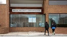 Two people enter a Social Security Administration office in suburban Detroit. - Fox Business News